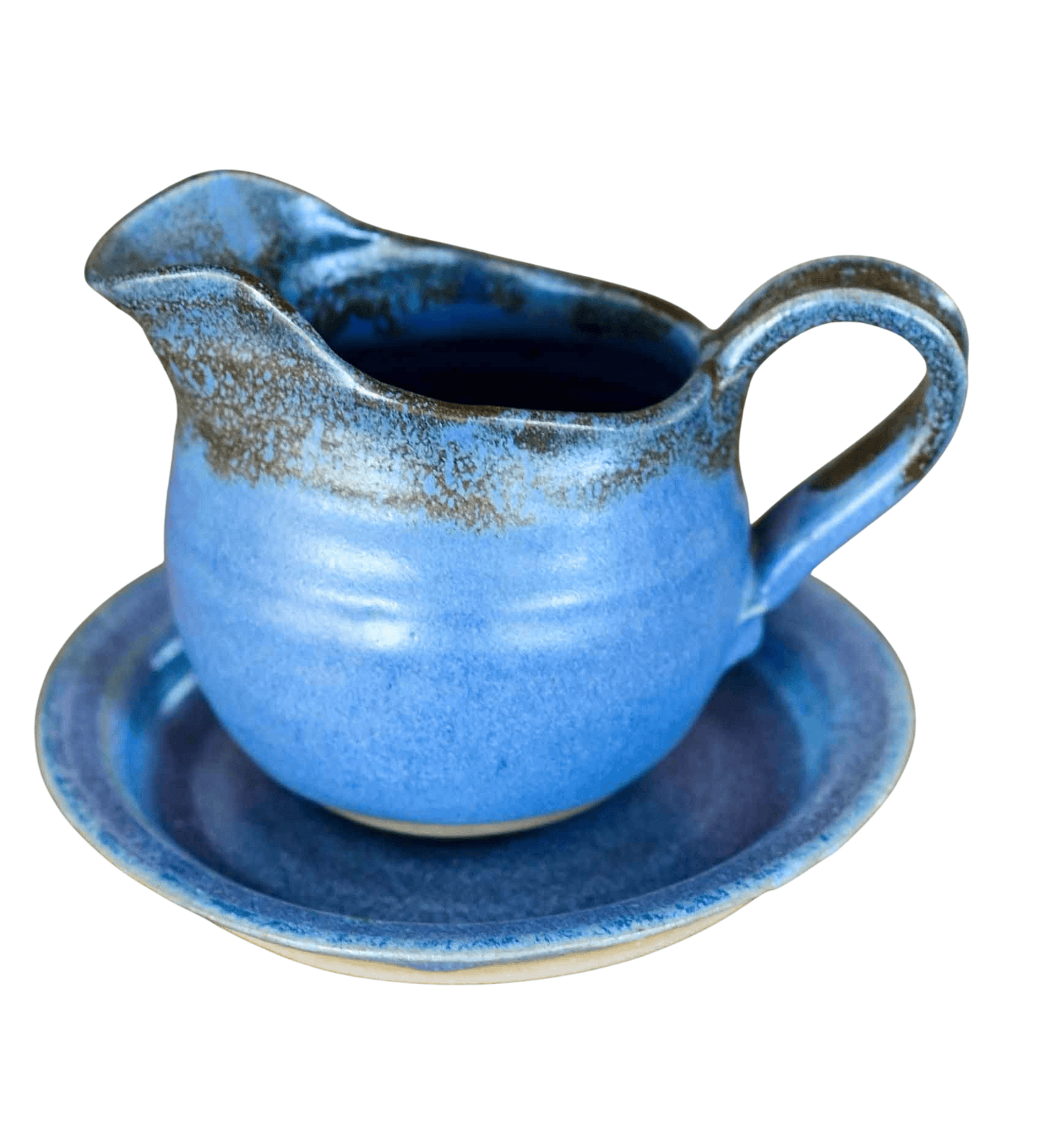 handmade blue pottery jug with plate