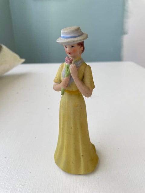 Vintage 70s/80s woman holding flowers