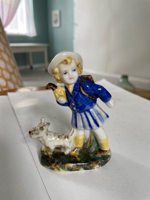 1940s girl with dog statue