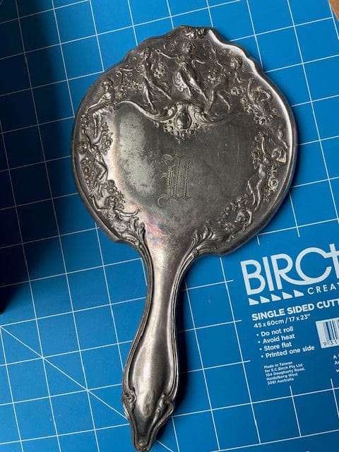 Antique silver plate hand mirror