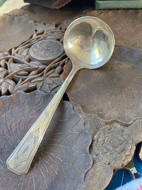 Vintage soup serving spoon