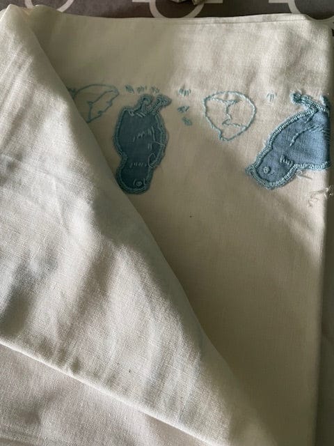 Vintage embroidered cot sheet