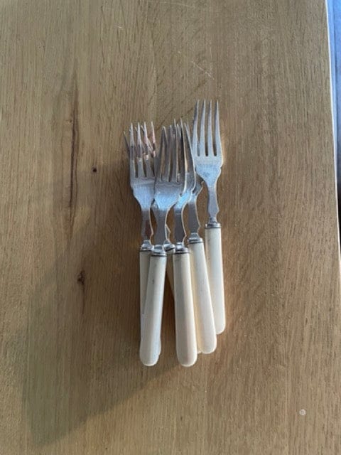 Antique forks with white handles x 6