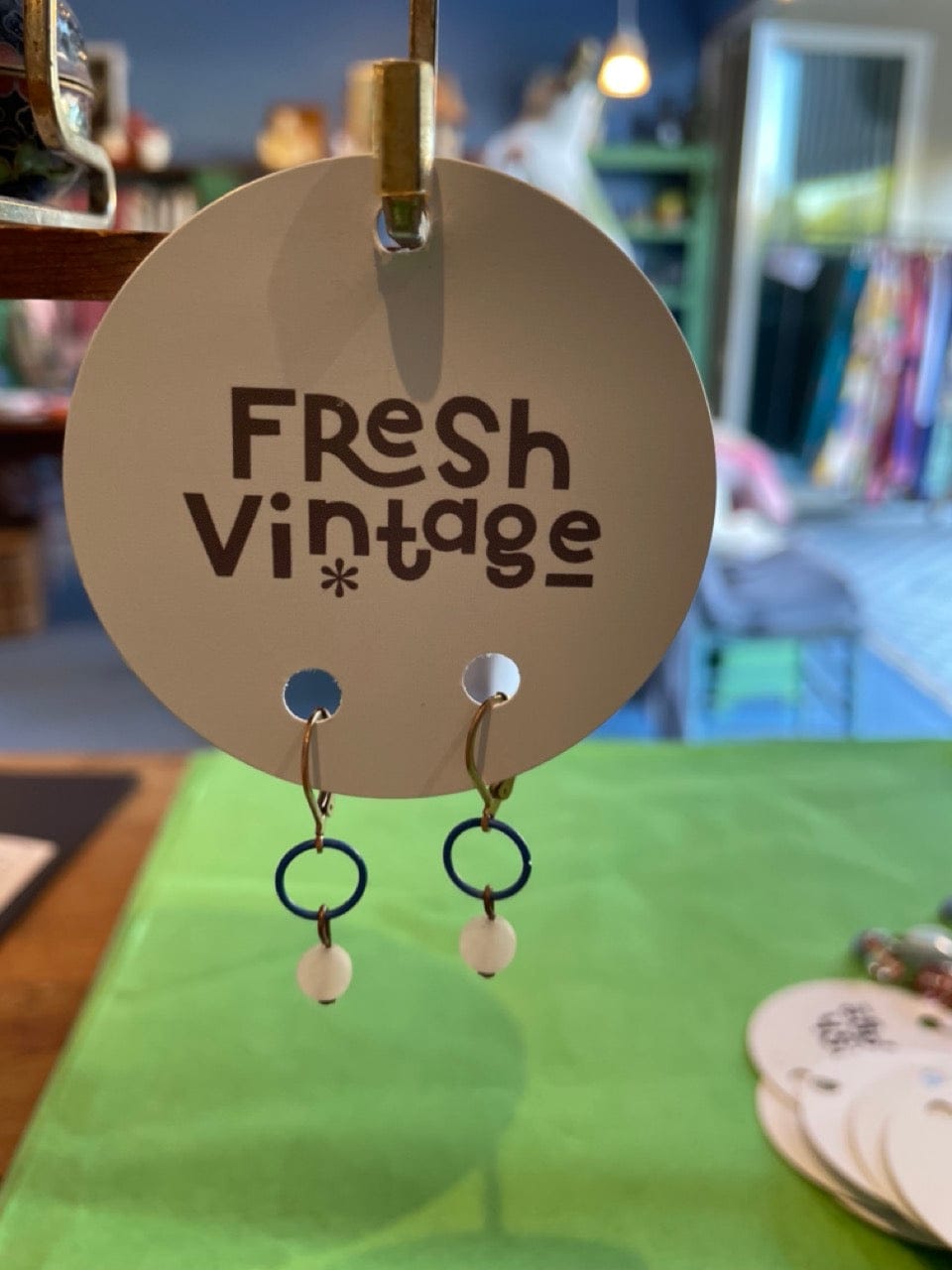 Vintage earrings pale green glass circle