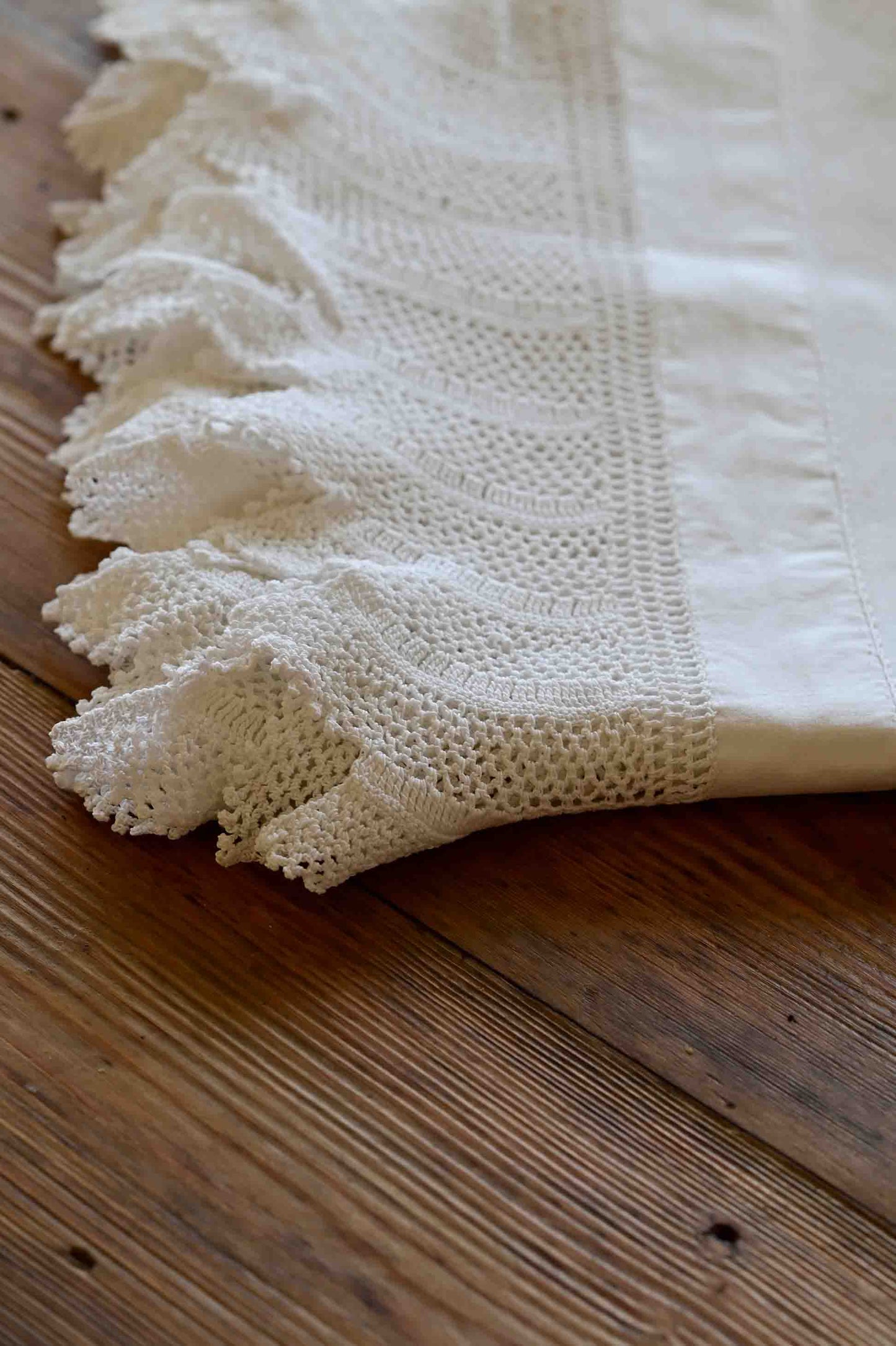White cotton tablecloth with lace edging