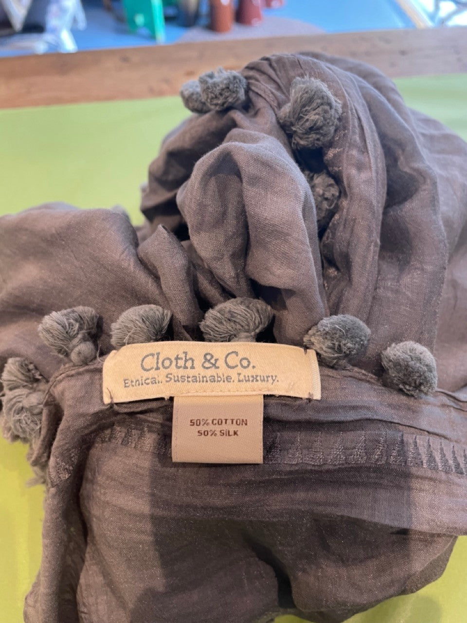 Cloth & Co. scarf grey pompoms