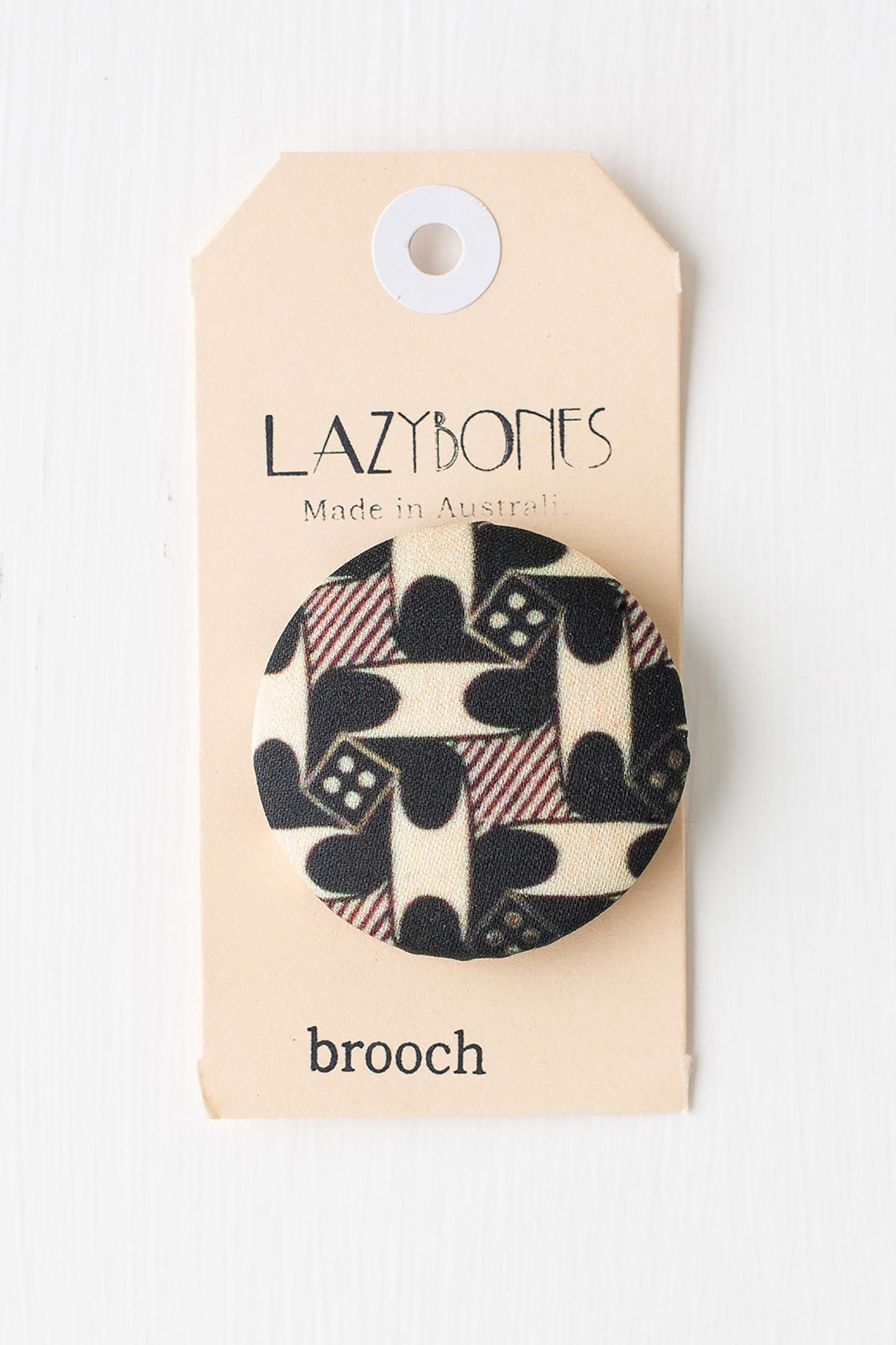 Domino brooch