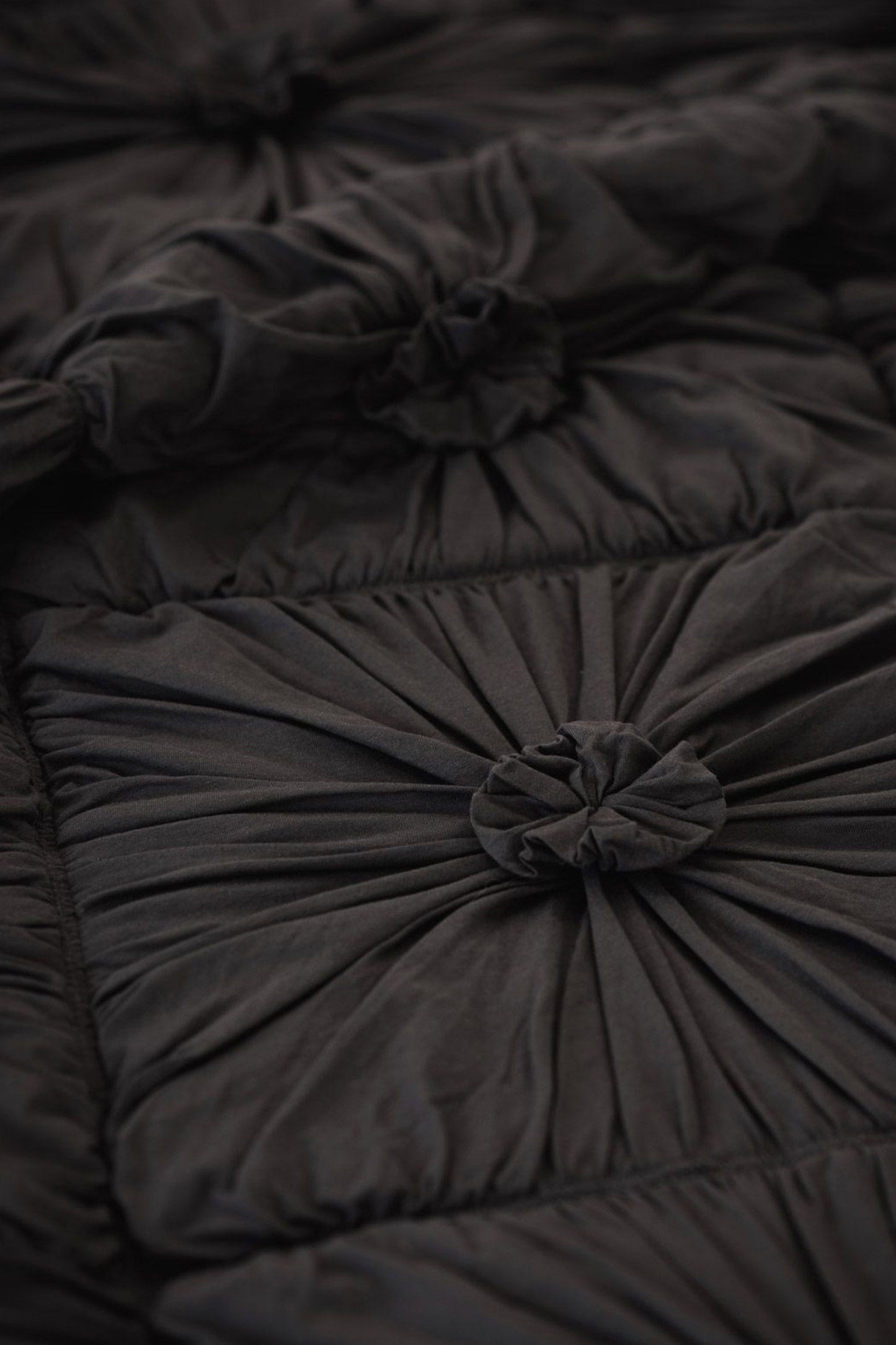 Rosette quilt in Charcoal *organic cotton