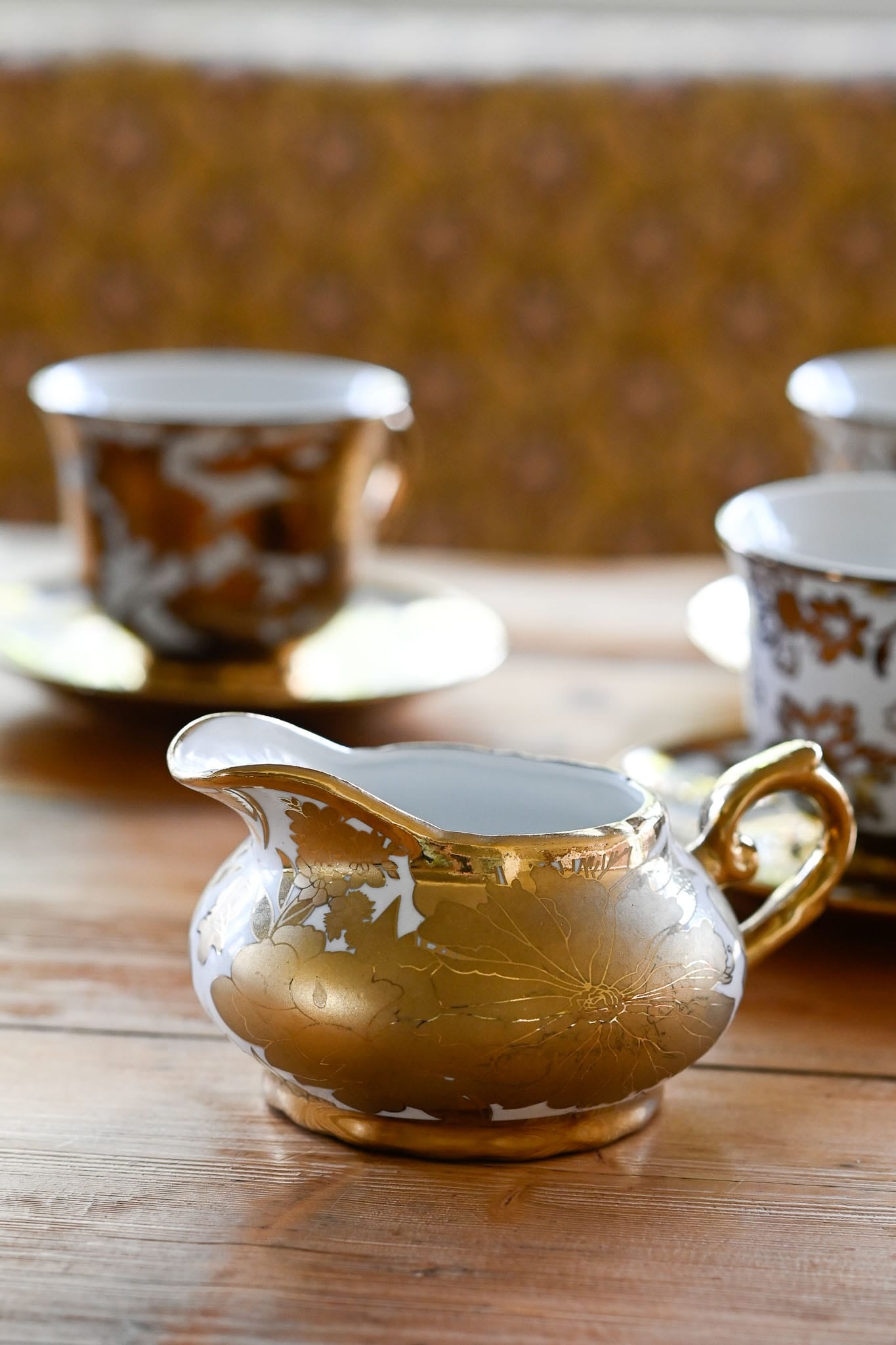 Vintage white and gold milk jug