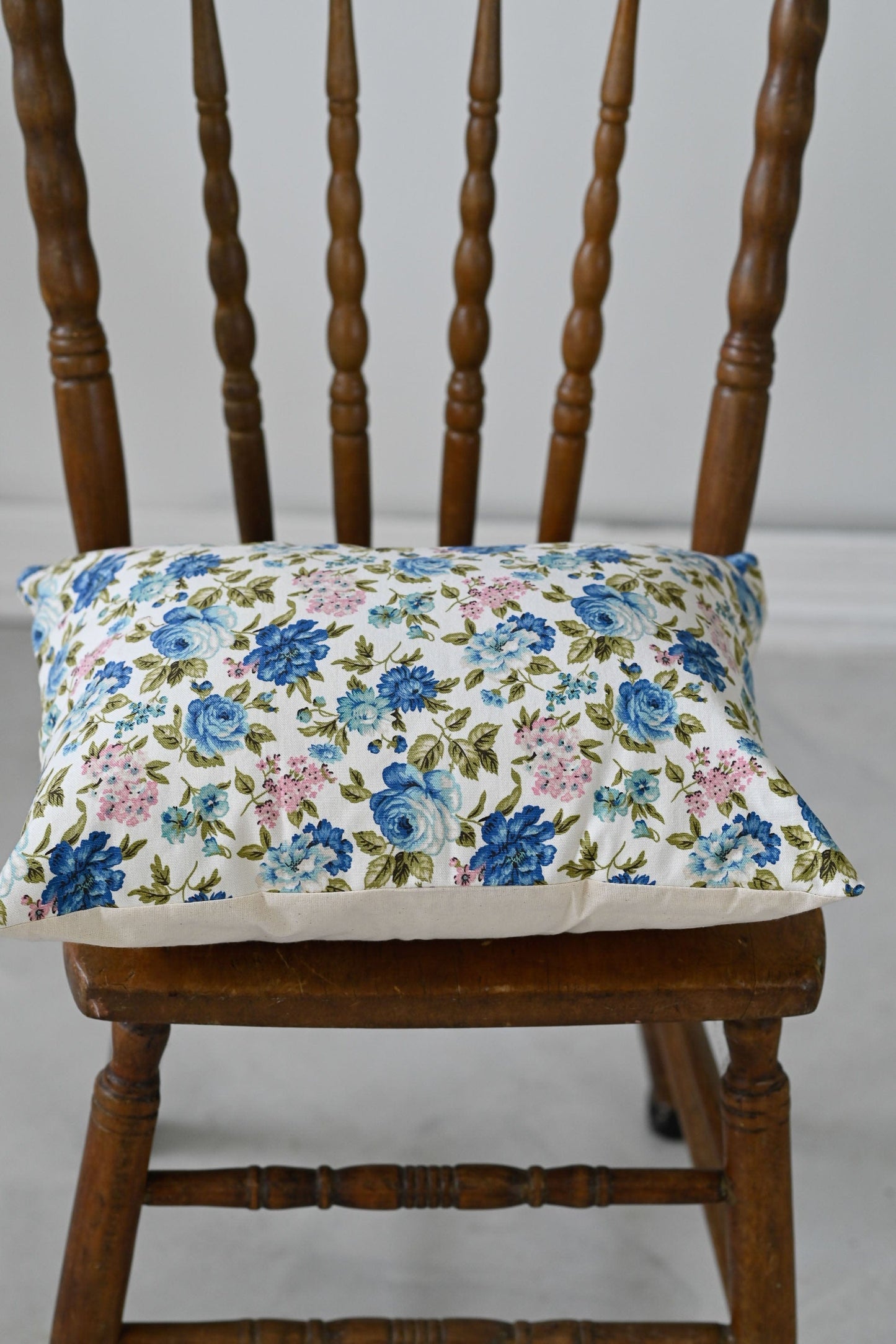 Vintage blue floral linen cushion