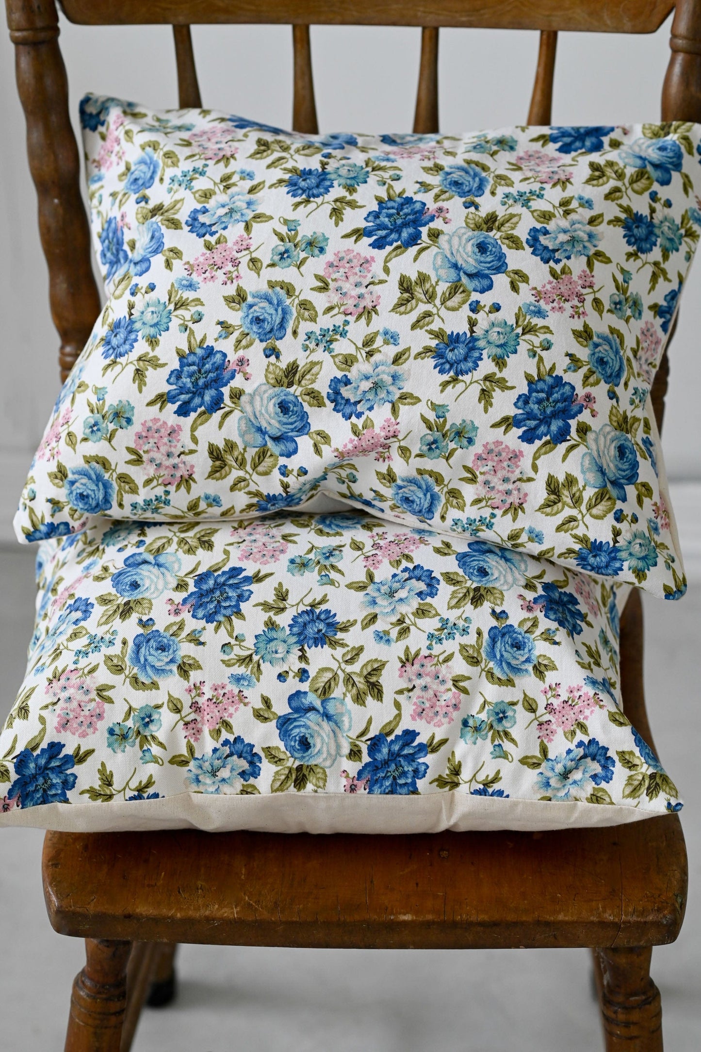 Vintage blue floral linen cushion