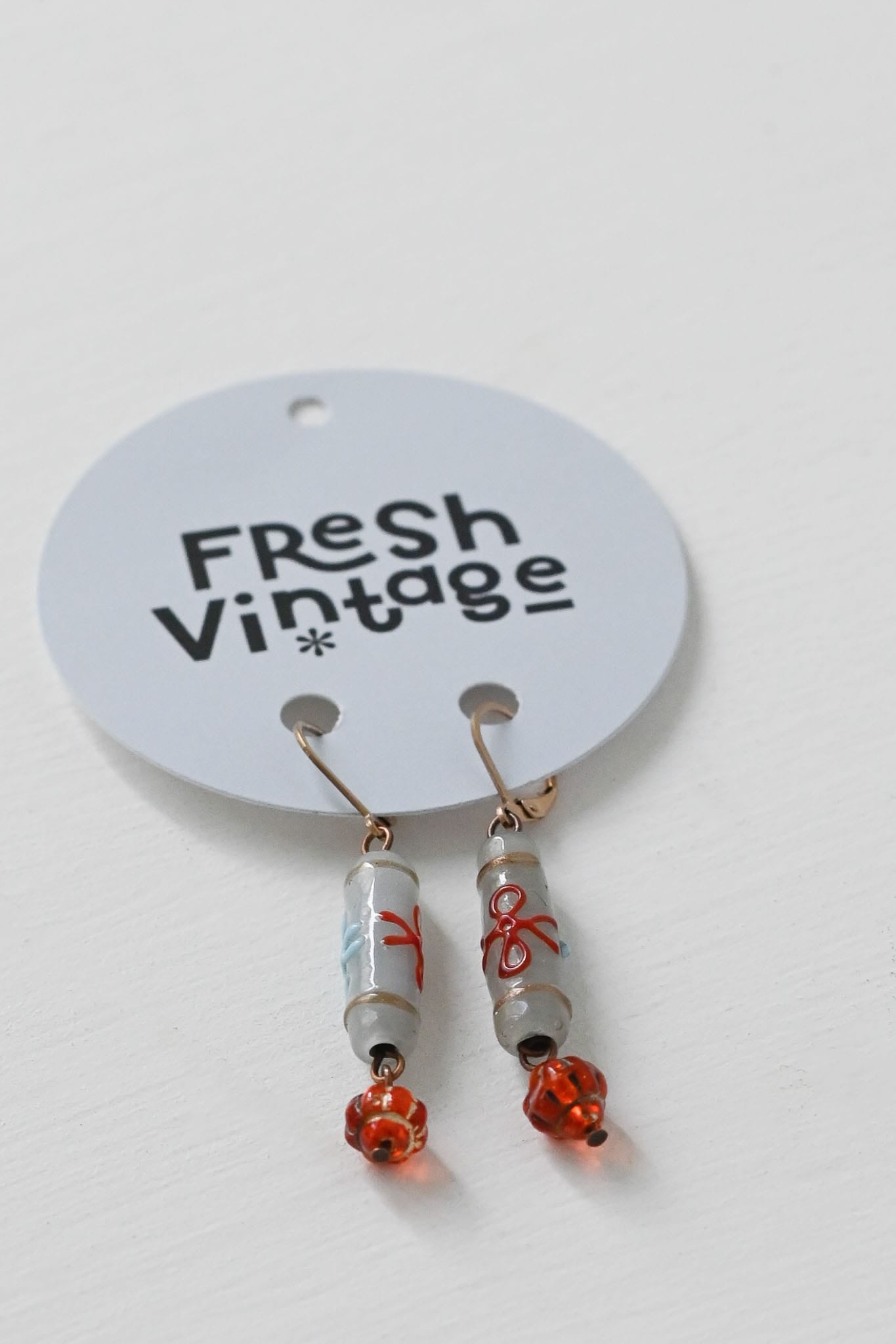 Earrings long blue beads with orange accents