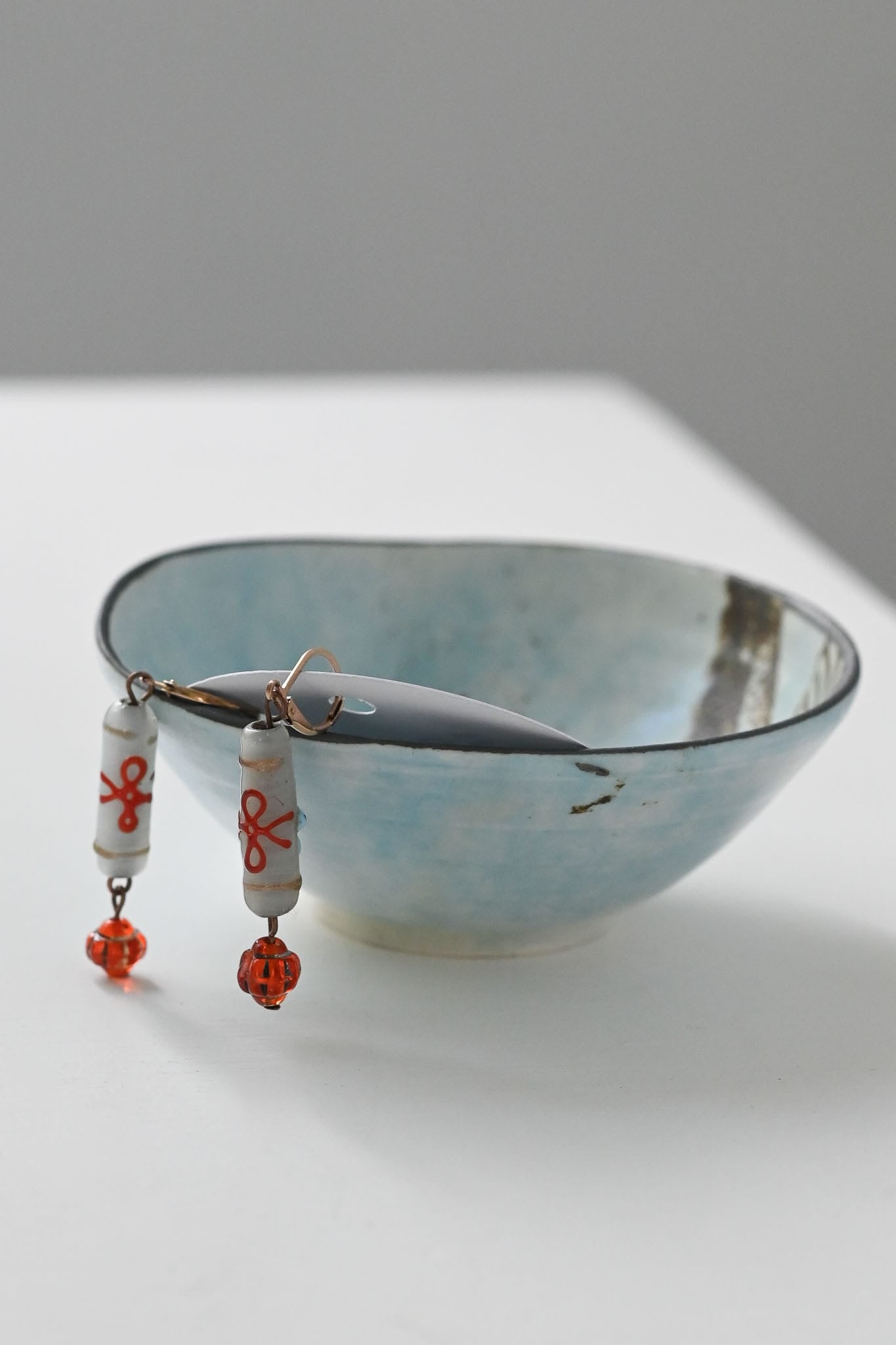 Earrings long blue beads with orange accents