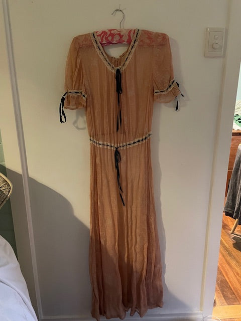 Vintage 1930s pink dress with black ribbon