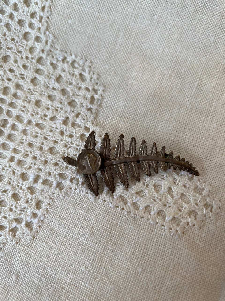 Vintage French fern brooch with Virgin Mary