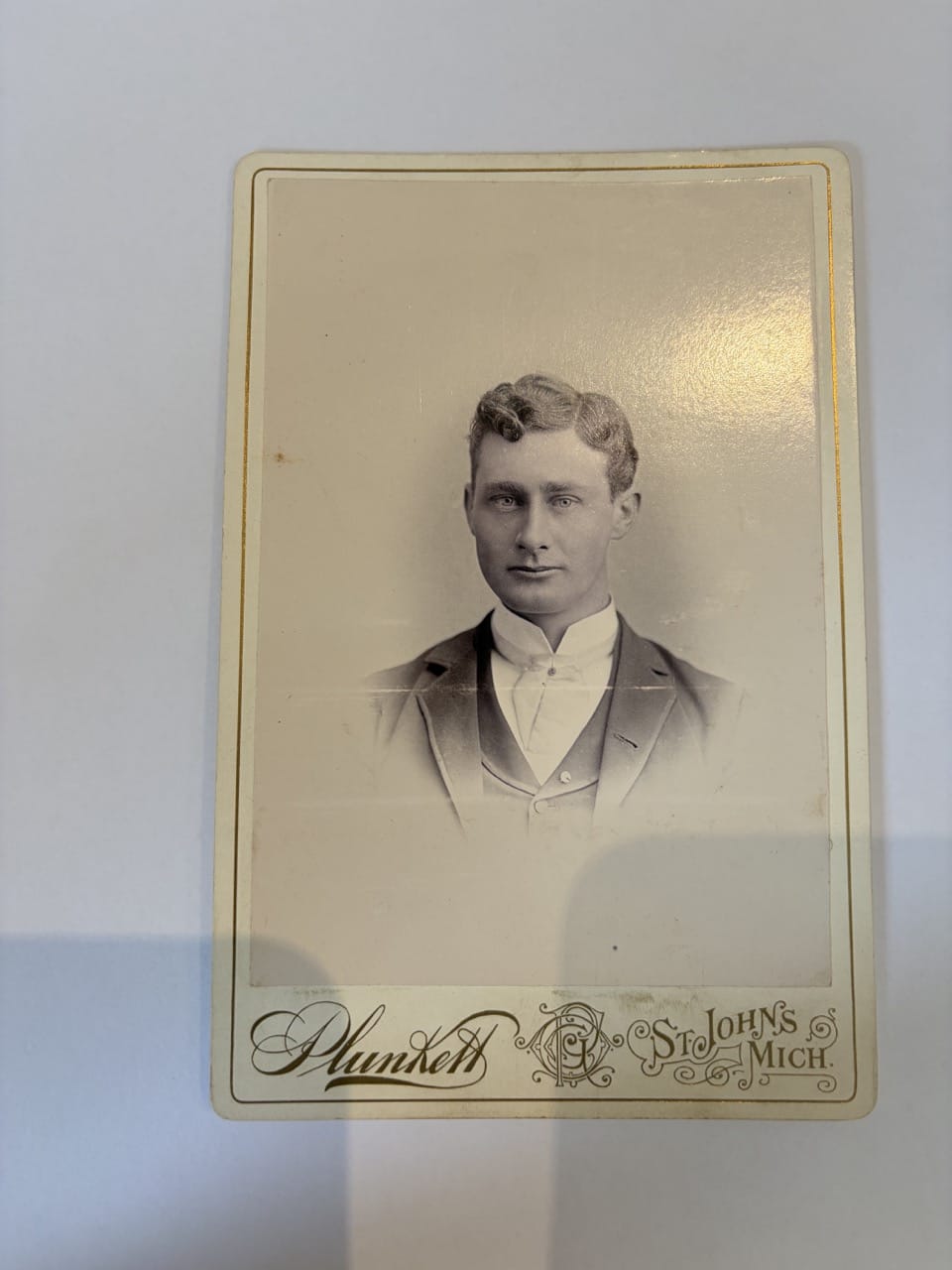 Antique sepia photograph of young man Plunkett St Johns Michigan