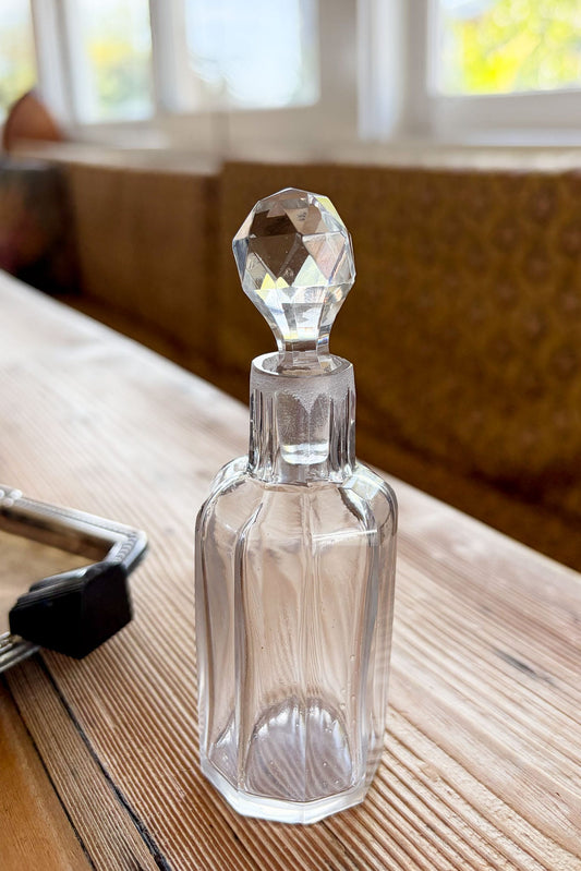 Antique glass perfume bottle with stopper