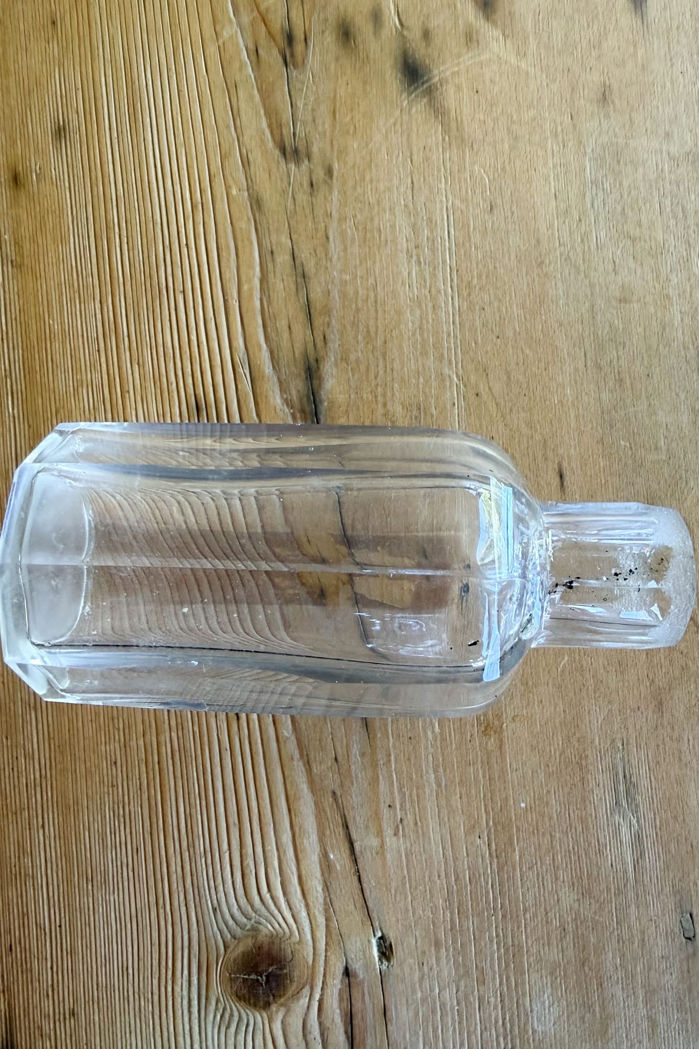 Antique glass perfume bottle with stopper