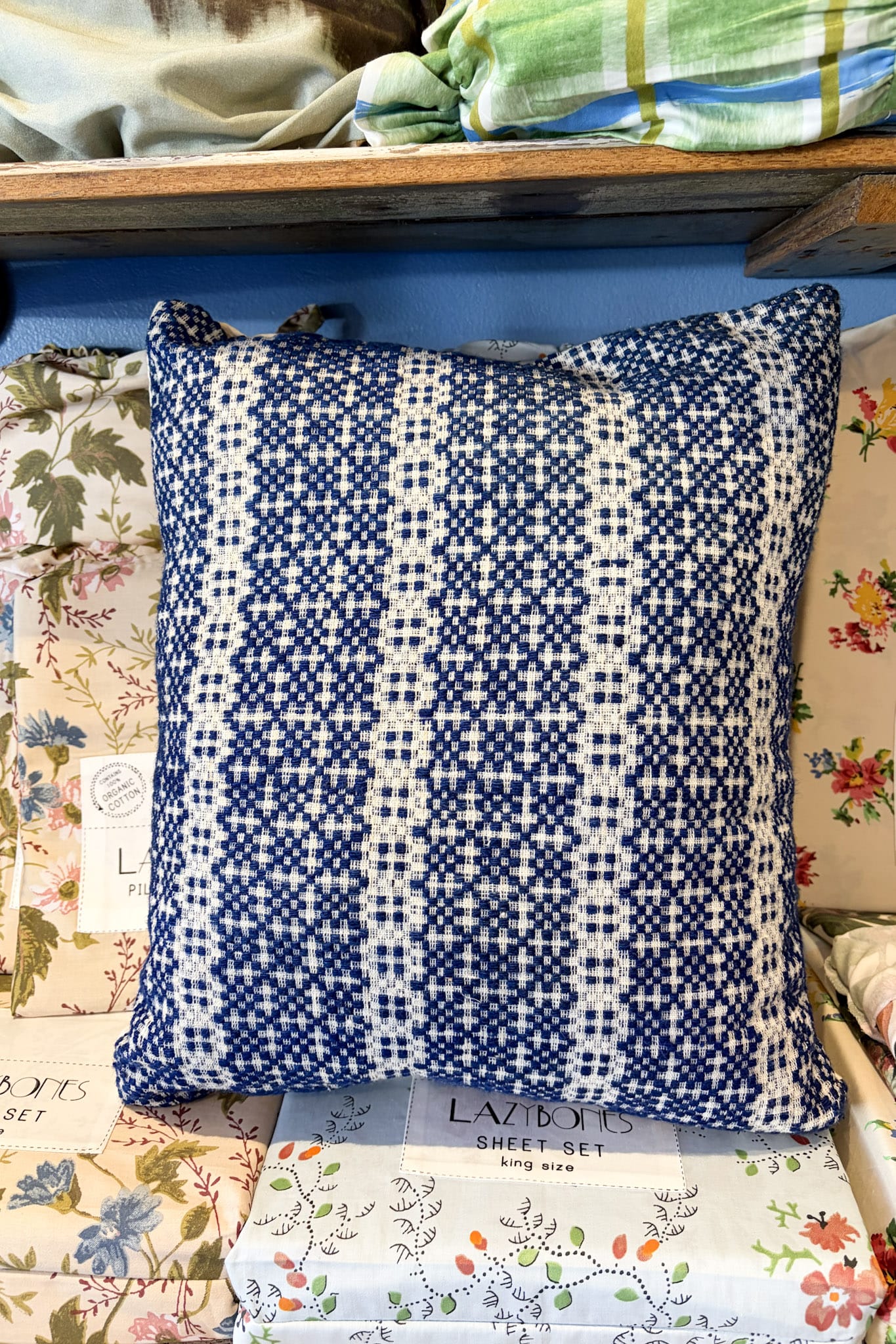 Vintage blue and white woven cushion