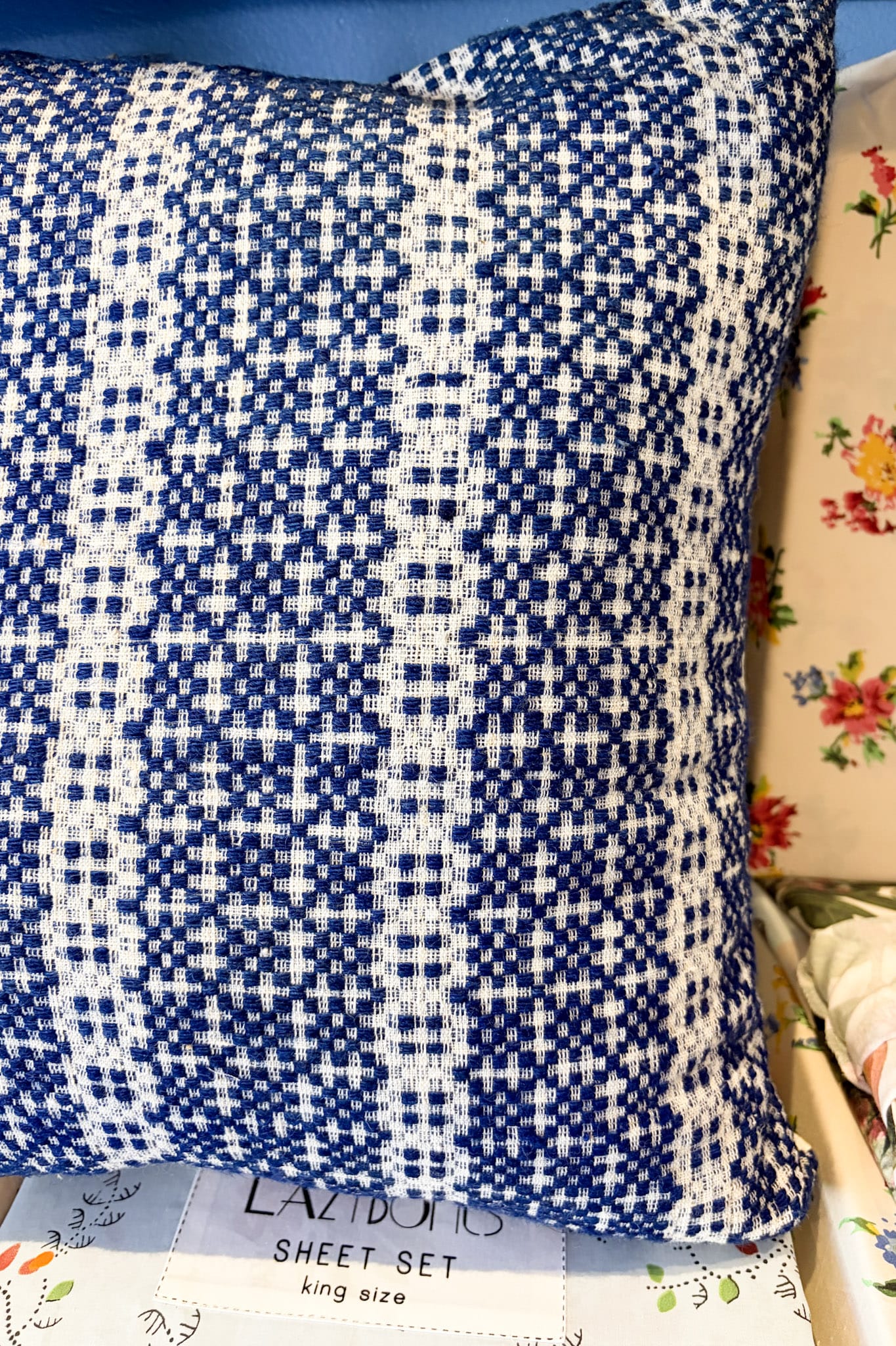 Vintage blue and white woven cushion