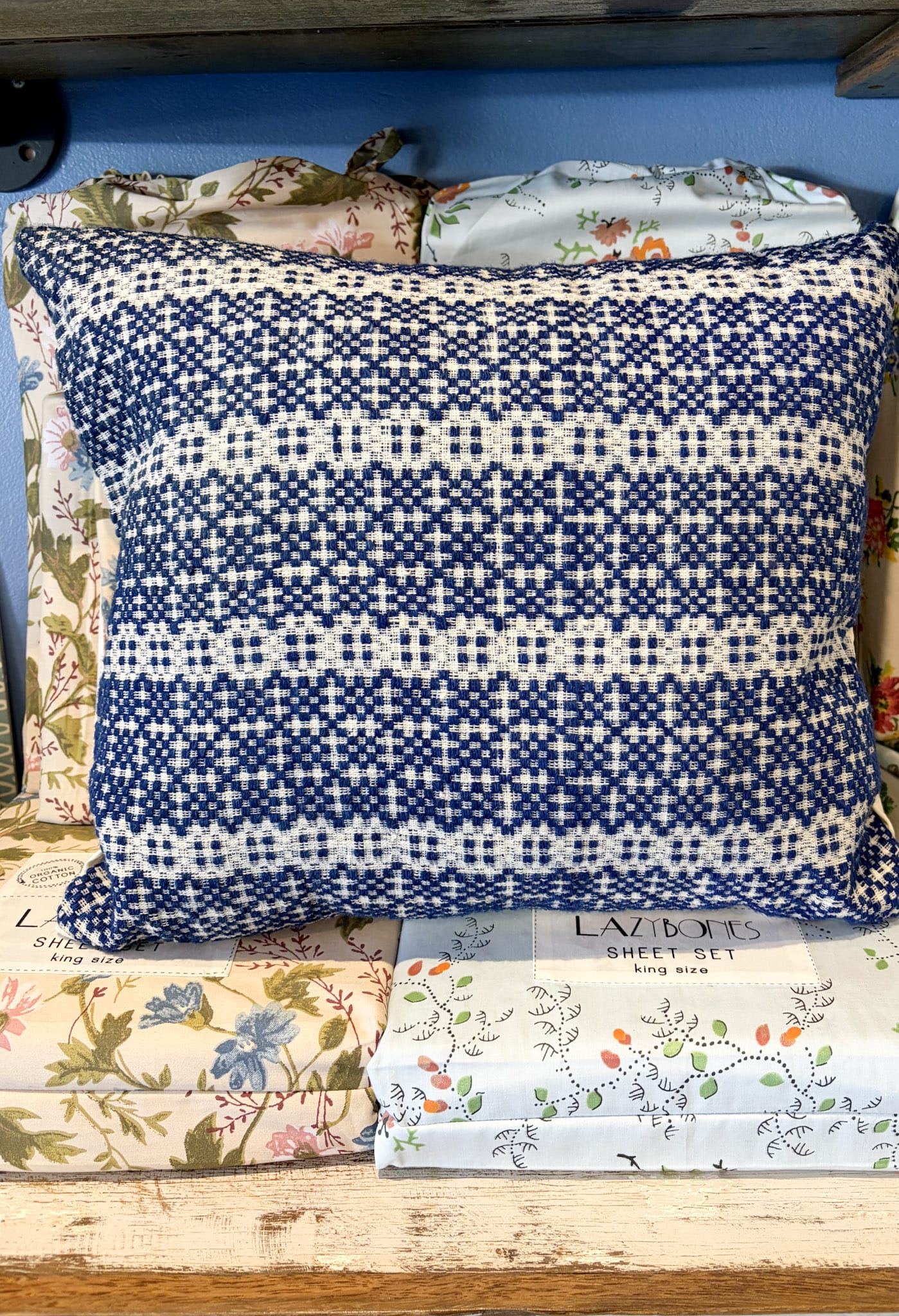 Vintage blue and white woven cushion