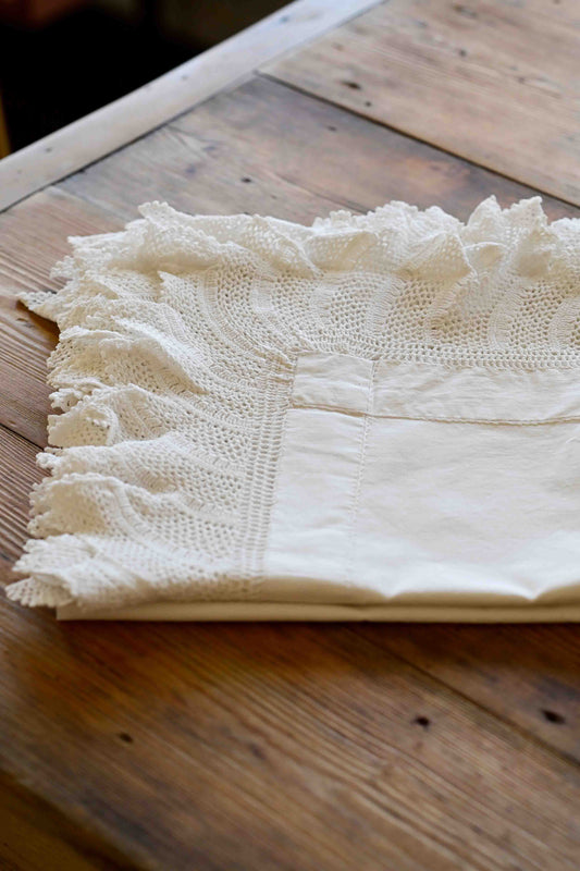 White cotton tablecloth with lace edging
