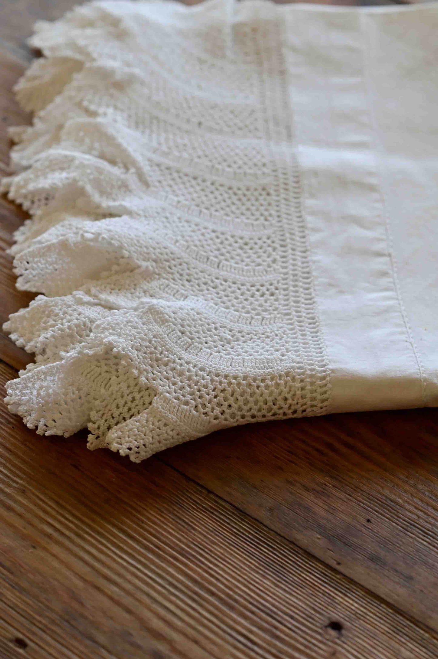 White cotton tablecloth with lace edging