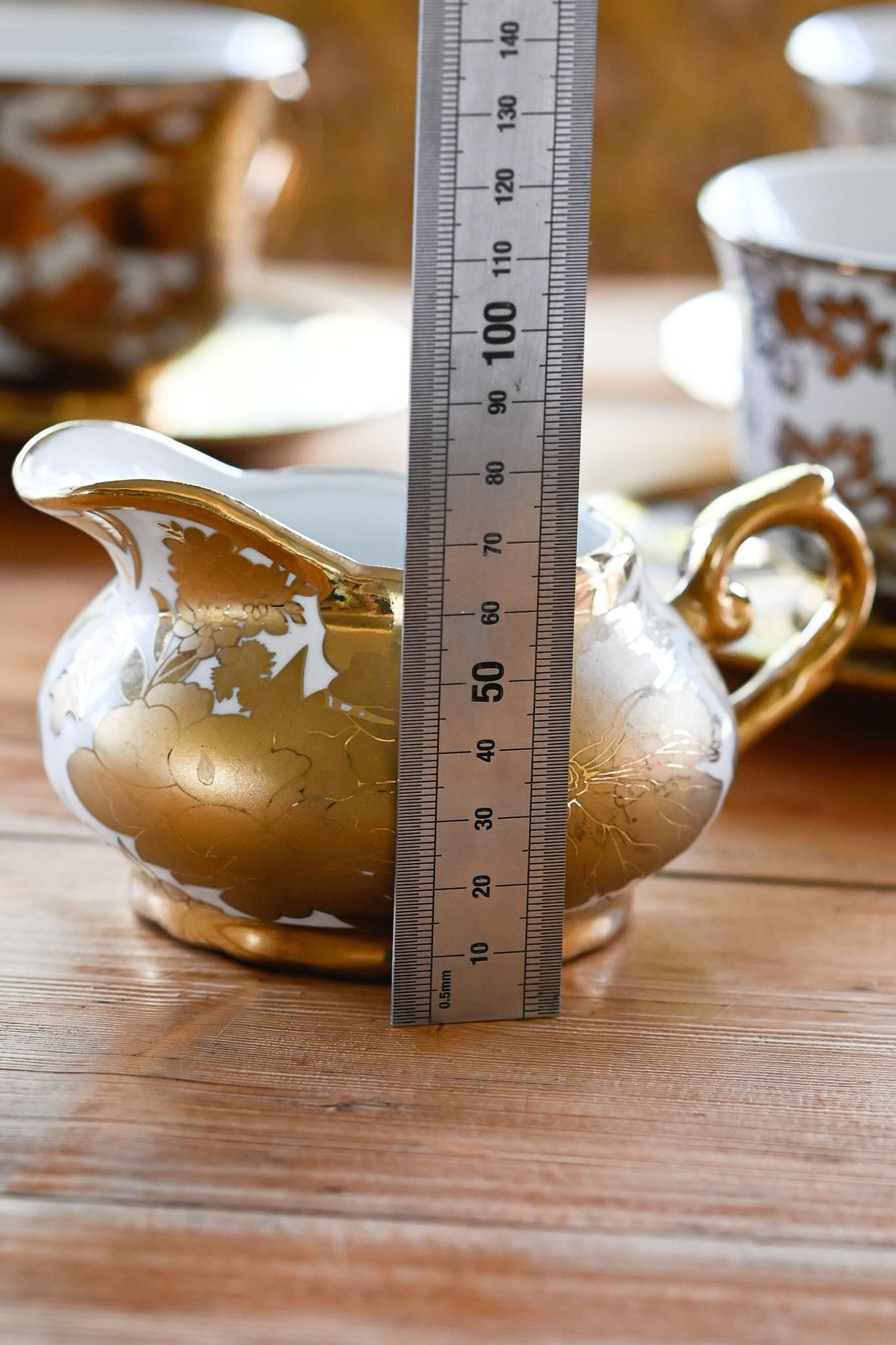 Vintage white and gold milk jug
